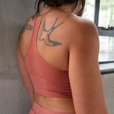 Back view of Branna organic cotton bralette, featuring razorback design and finish. Naturally dyed with Rubia root
