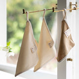 Big Brin’s double-sided organic cotton fabric cream. With useful loop to hang it up.
