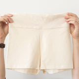 Flat lay of Lui organic cotton high-waist booty shorts, front view